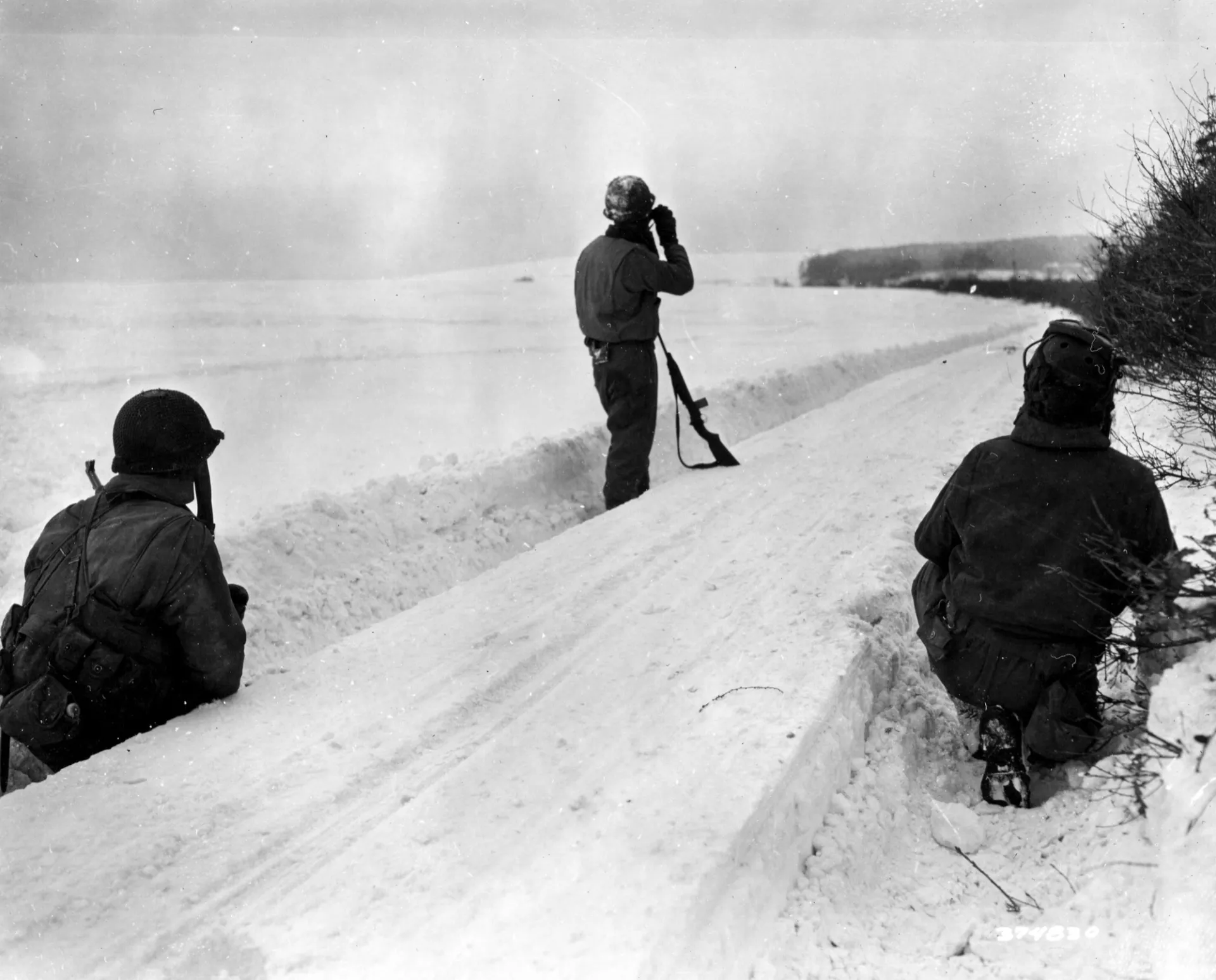 American soldiers in the snow during the Battle of the Bulge